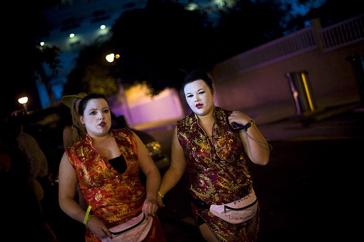 24 hours in pictures: Students in fancy dress during night of parties during the SalouFest