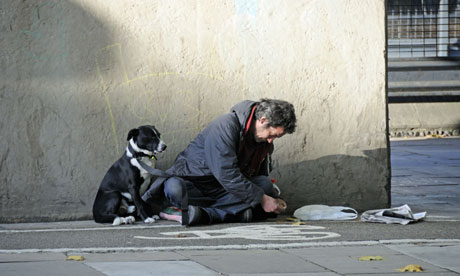 Homeless man with his dog on Euston Road 
