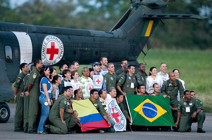 Colombia hostage release: Crew members of a Brazilian army helicopter and Red Cross members