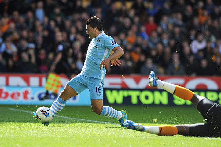 City versus United: Manchester City's Sergio Aguero scores their first goal against Wolves