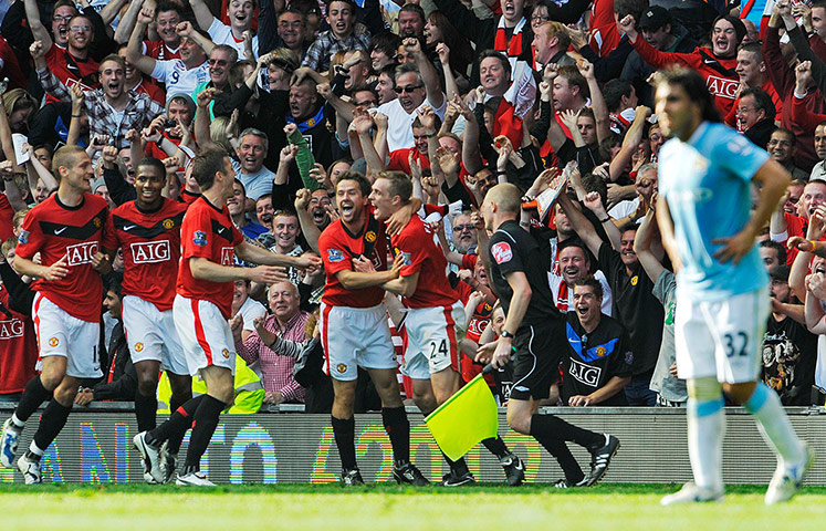 Past Manchester derbies: Michael Owen celebrates the winner with Darren Fletcher