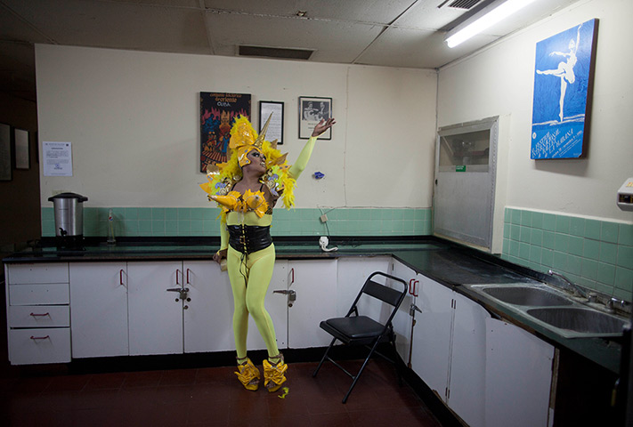 24 hours: Managua, Nicaragua: A dancer poses after Miss Gay Nicaragua beauty contest 