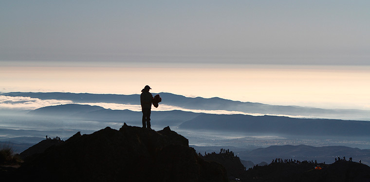 24 hours: Cordoba, Argentina: A man waits for cars during the 32nd World Rally