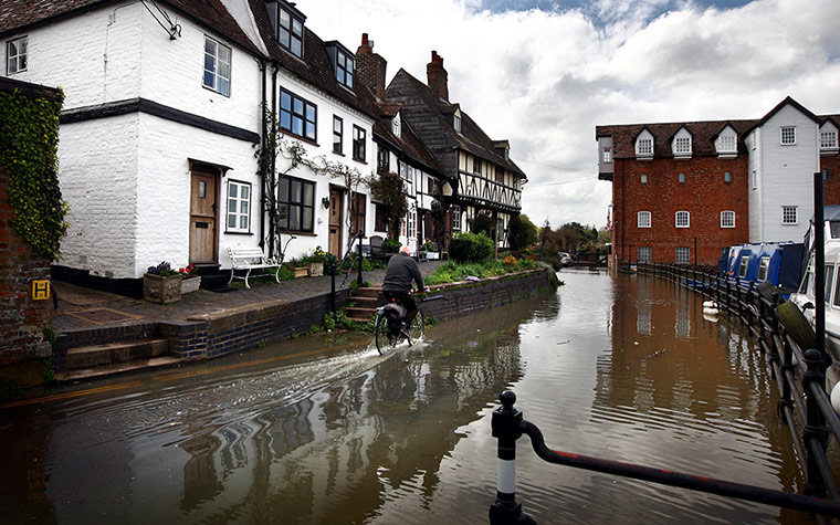 Picture desk live: Floodwaters are rising around Mill Street, Tewkesbury