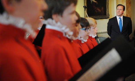 David Cameron listens to the Westminster Abbey boys' choir at an Easter reception at Downing Street