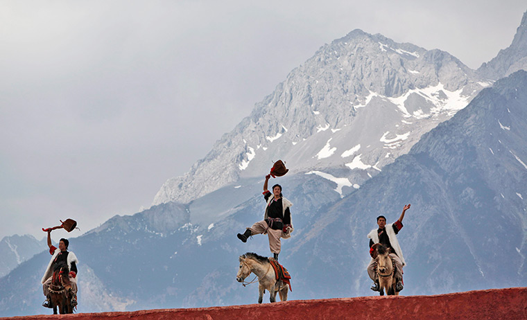 FTA: How Hwee Young: Members of the Naxi, Yi and Bai ethnic minorities perform a cultural show