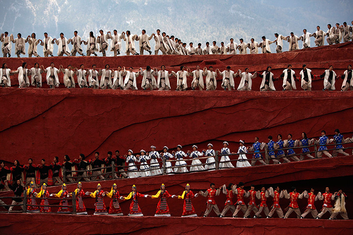 FTA: How Hwee Young: Members of the Naxi, Yi and Bai ethnic minorities perform a cultural show