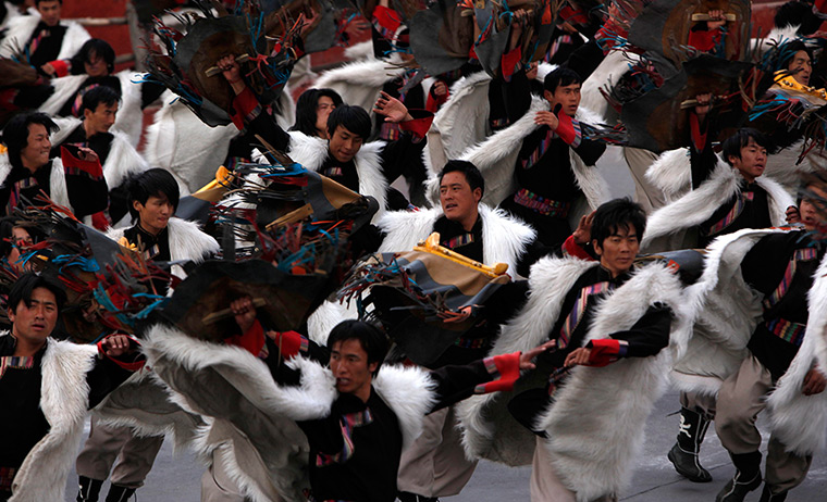 FTA: How Hwee Young: Members of the Naxi, Yi and Bai ethnic minorities perform a cultural show 