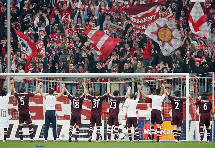 Real v Bayern: Bayern Munich players and fans celebrate beating Real Madrid
