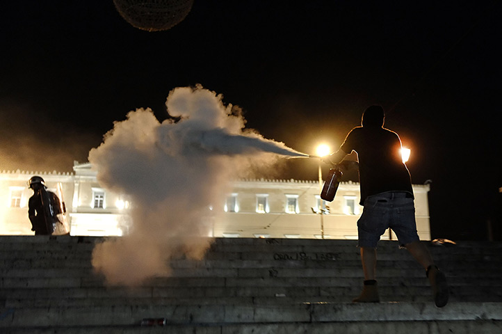 24 hours in pictures: Demonstrators clash with riot police  in Athens