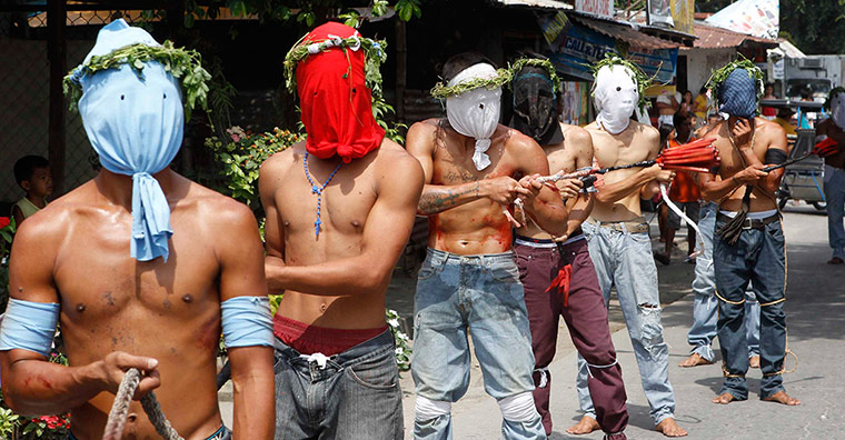 Easter: Hooded barefoot penitents in Philippines