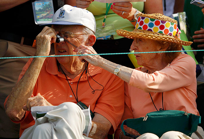 Masters: Members of the gallery watch the Masters