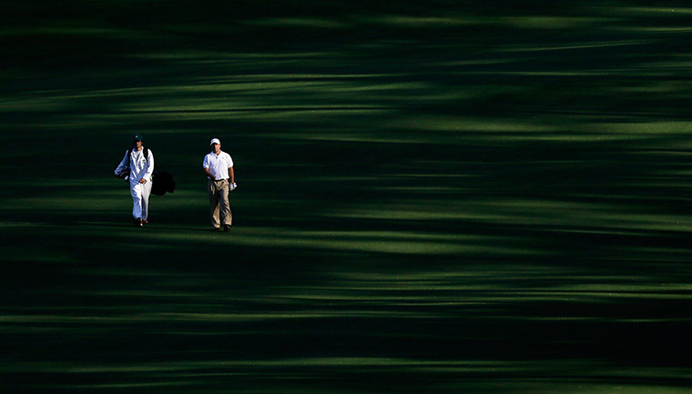 Masters: Jose Maria Olazabal and caddie walk down the second fairway