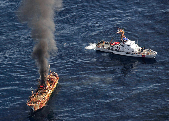 Ryou-Un Maru: Ryou-Un Maru alight after the US Coast Guard fired explosive ammunition