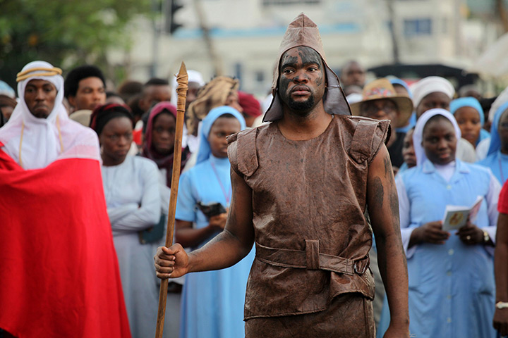 Good Friday traditions: Lagos, Nigeria: A man dresses as guard during a ritual procession