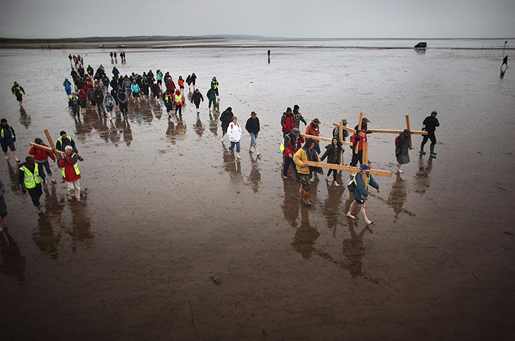 Good Friday traditions: Berwick-upon-Tweed, England: Pilgrims walk with crosses