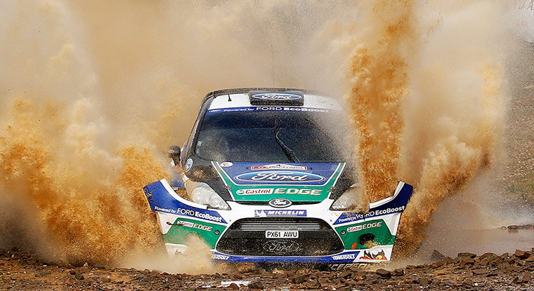 Best of the week: Petter Solberg and Chris Patterson drive their Ford Fiesta through a puddle