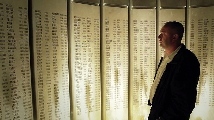 Bosnia: Satko Mujagic at the memorial to the dead of his village, Kozarac, in 2010