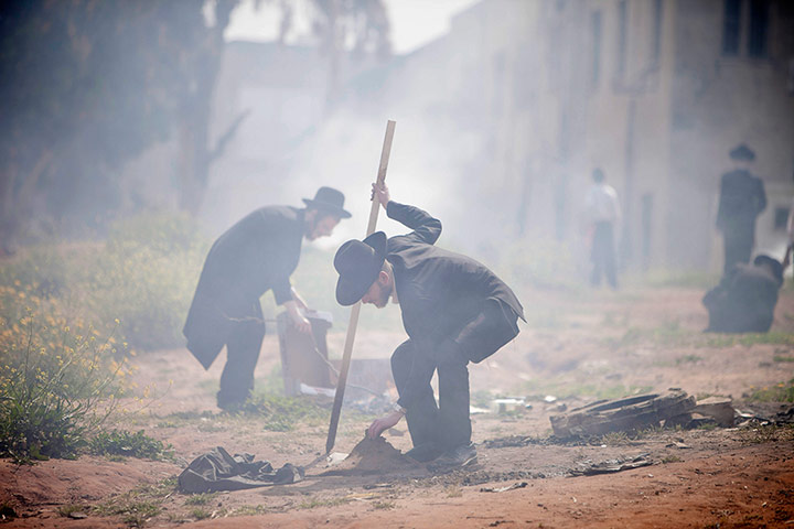 24 hours: Ultra-Orthodox Jewish men burn leavened items