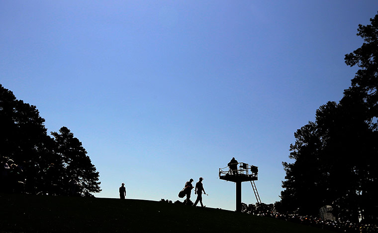 Augusta day 3: Tiger Woods walks down the fourth fairway 