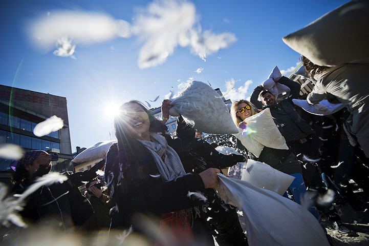 24 hours: People attend a flash-mob pillow fight in Stockholm