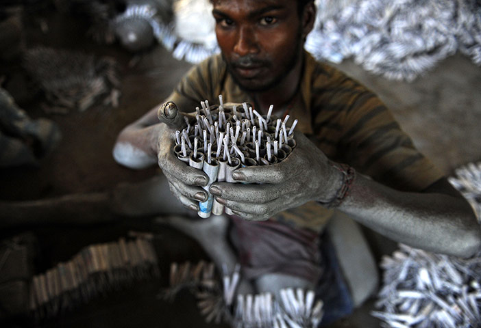 24 hours: A man makes firecrackers in Sri Lanka