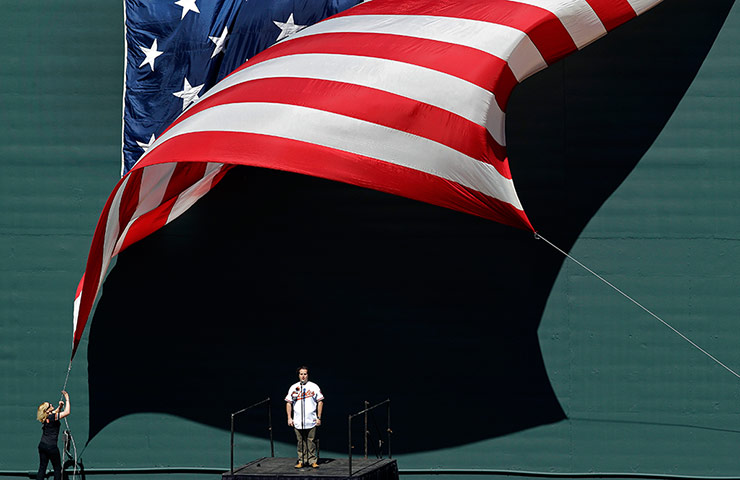 24 hours: Rolando Sanz performs the national anthem at the Baltimore baseball game 