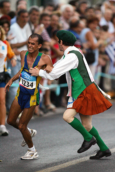 Sport protests: Vanderlei Lima of Brazil is blocked by Neil Horan