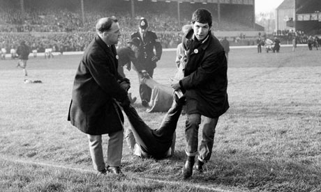 An anti-apartheid demonstrator is dragged off the Twickenham pitch, 1969