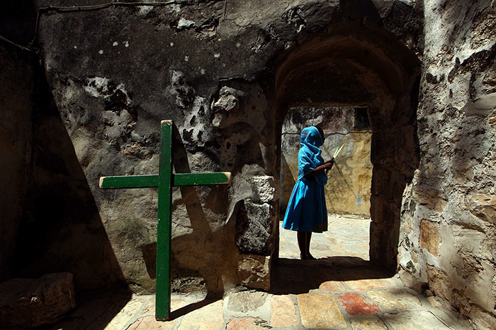 Easter Sunday: Ethiopian Orthodox Christian woman holds palm tree leaves
