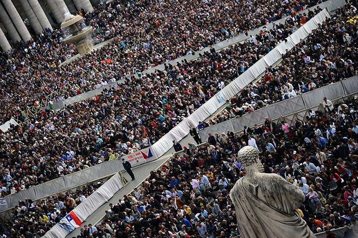 Easter Sunday: Faithful stand at St Peter's square during the Easter Holy Mass