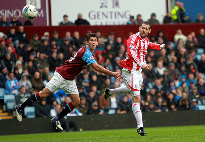villa v stoke: Rory Delap heads towards the Villa goal