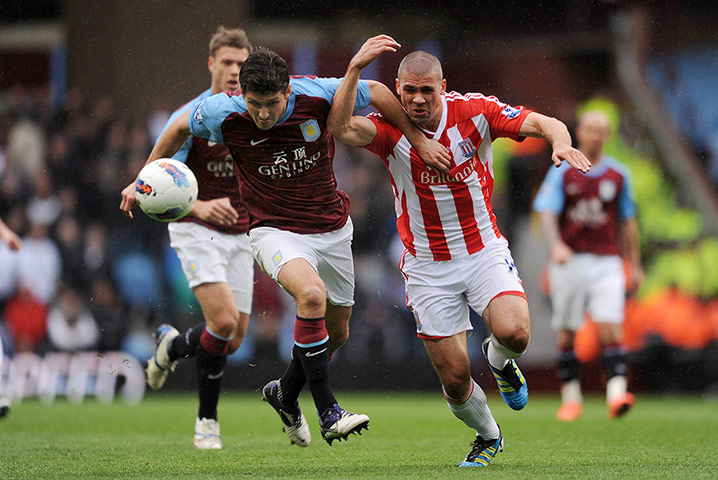 villa v stoke: Eric Lichaj of Aston Villa goes for the ball  Jonathan Walters