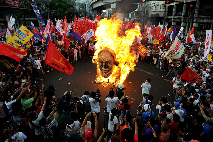 May Day 2012: Manila: Burning the effigy of Philippine President Benigno Aquino