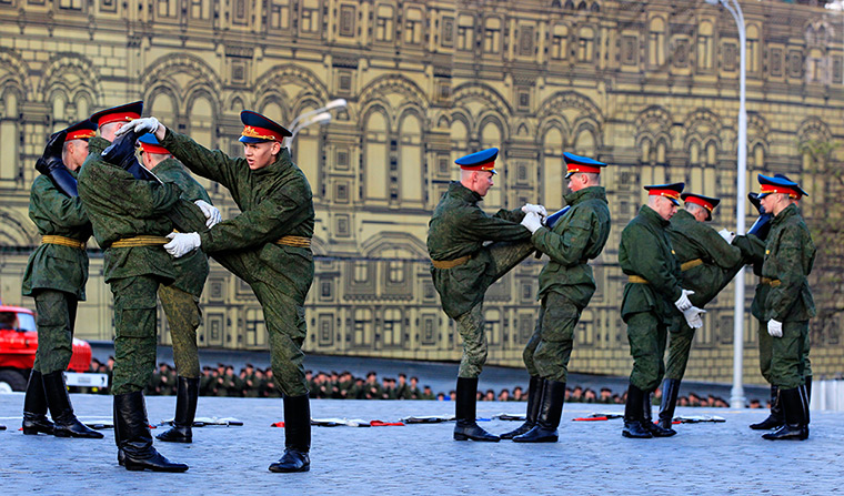 24 hours in pictures: Russian honor guard soldiers stretch during a rehearsal for the Victory Day