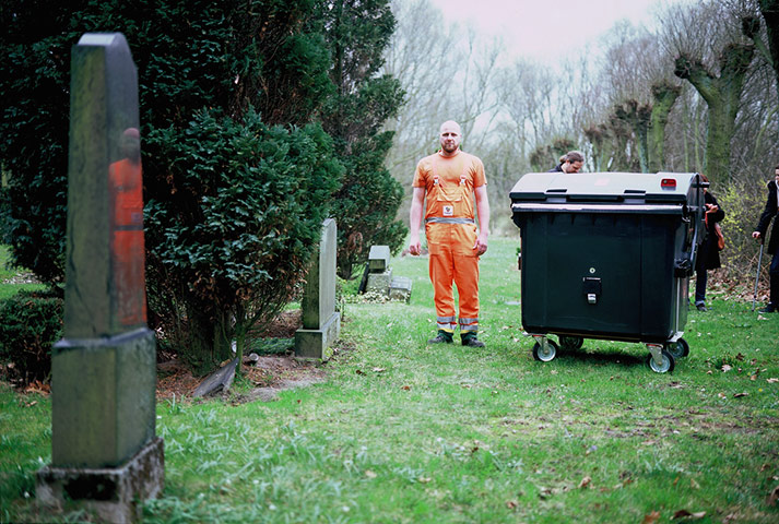 Trashcam: Binman Hans-Peter Strahl taking a picture of a church in Hamburg 