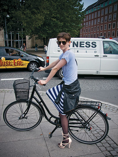 Big Picture, bikes: Big Picture: girl looking styling wearing heels on a bike