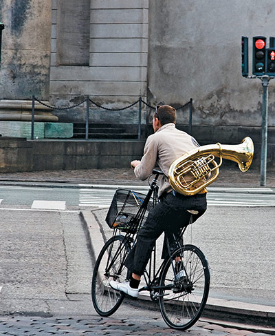 Big Picture, bikes: Big Picture: Man with a trumpet on a bike