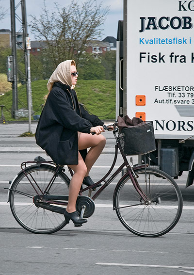 Big Picture, bikes: Big Picture:. woman wearing a headscarf on abike
