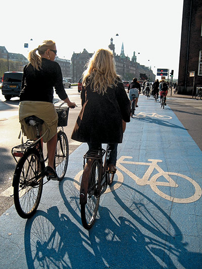 Big Picture, bikes: Big Picture: two girls on a cycle lane