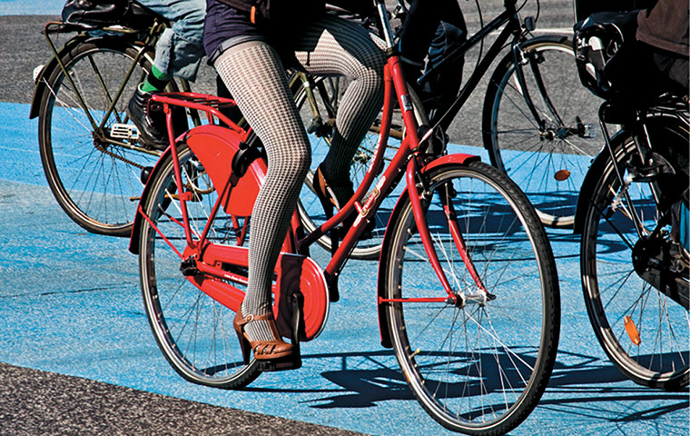 Big Picture, bikes: Big Picture: woman on a red bike