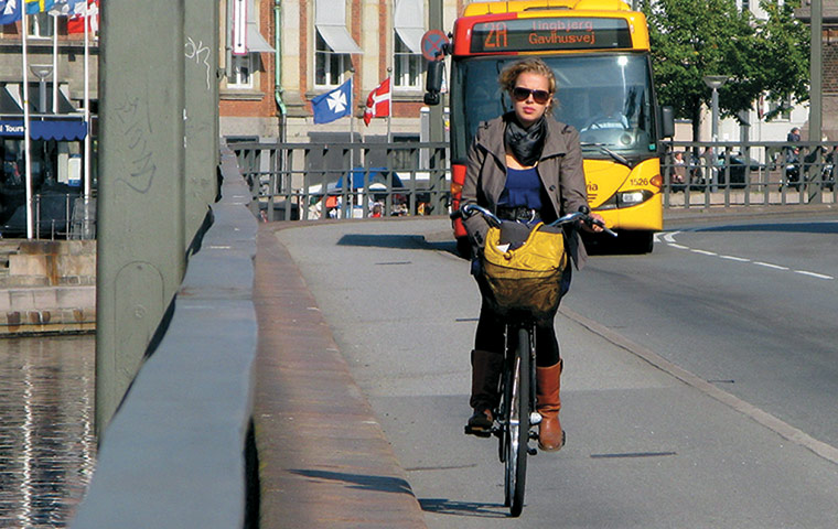 Big Picture, bikes: Big Picture: girl cycling on a path