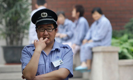 A security guard outside Chaoyang hospital, China