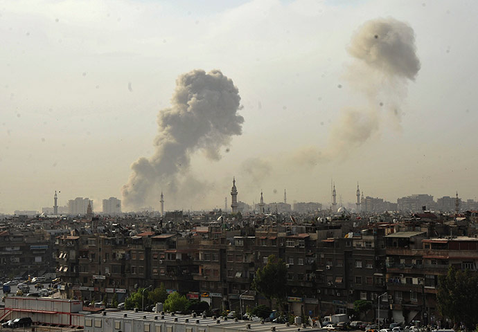 Damascus Bombs: Smoke rises over the city of Damascus after the explosions