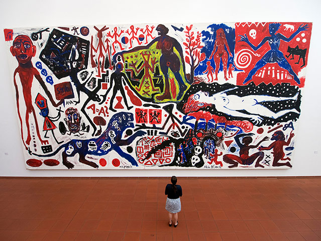 Eurostar Cologne Gallery: Woman looking at painting Ich in Deutschland by A R Penck at Museum Ludwig