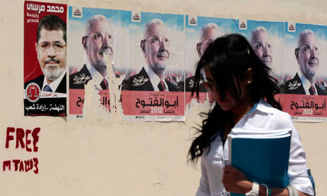 Egypt election campaign posters: Mohamed Mursi and Abdel Moneim Abu El Fotouh