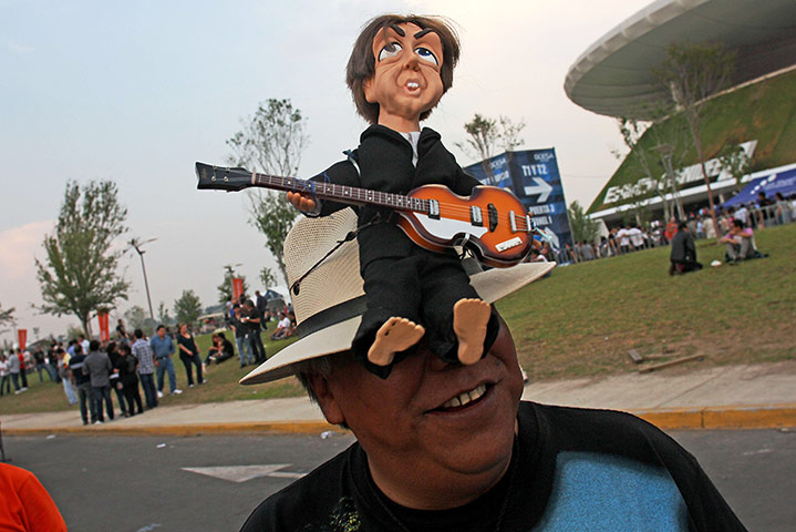 Week in Music: A Paul McCartney fan waits outside at the Omnilife Stadium