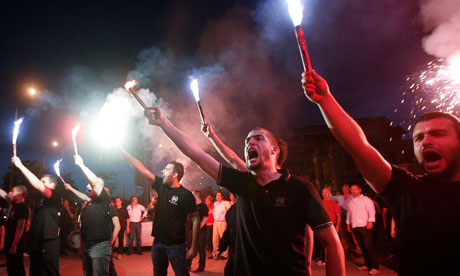 Supporters of the neo-Nazi Golden Dawn party celebrate their success in elections in Greece