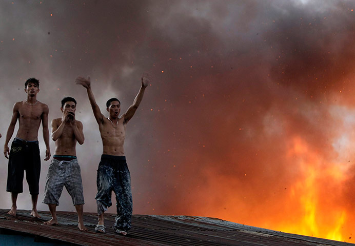 Manila: A blaze at a shanty town in Manila's seaport area.