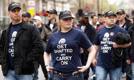 Off-duty police officers march in protest at funding cuts through central London